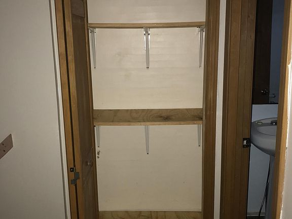 Closet right next to the bathroom