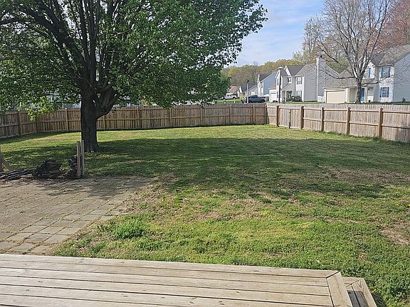 Backyard View from the new deck. Privacy fence added.