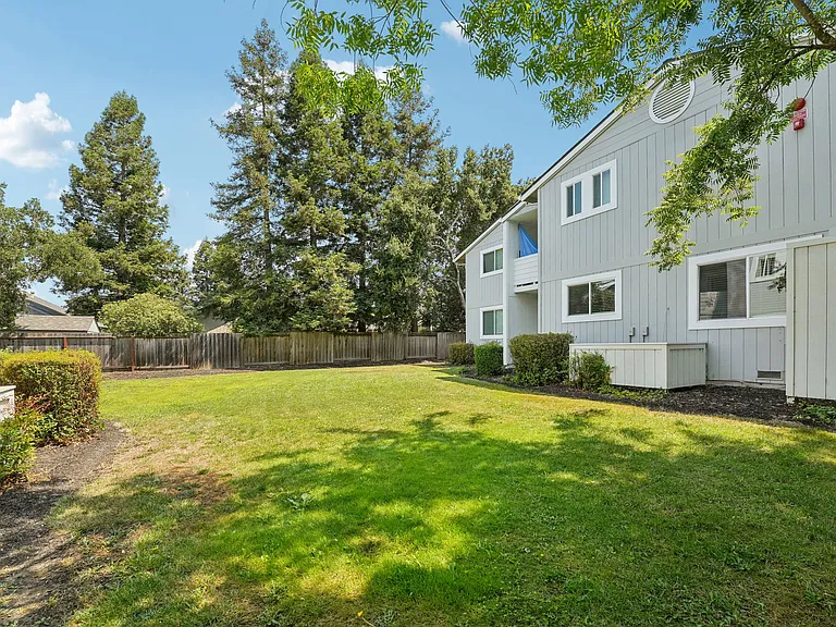 Lushly landscaped garden-style property.
