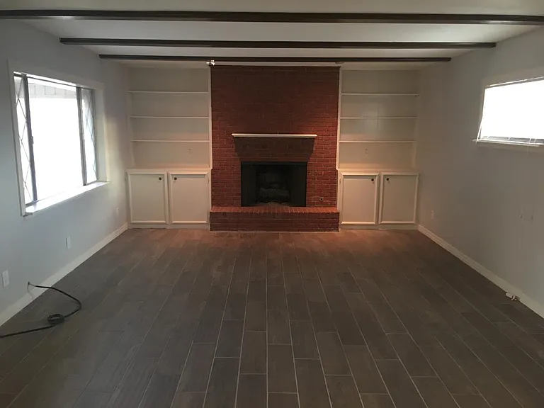 Den with gas fireplace