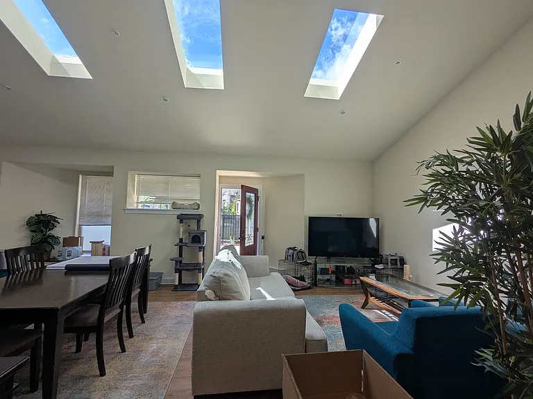 Living Room to Front Door with Skylights