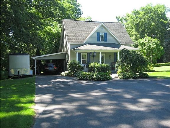 HOME HAS 1 COVERED PARKING SPACE THAT CAN EASILY BE CONVERTED INTO ATTACHED GARAGE SPACE WITH THE DOOR LEADING INTO LAUNDRY ROOM