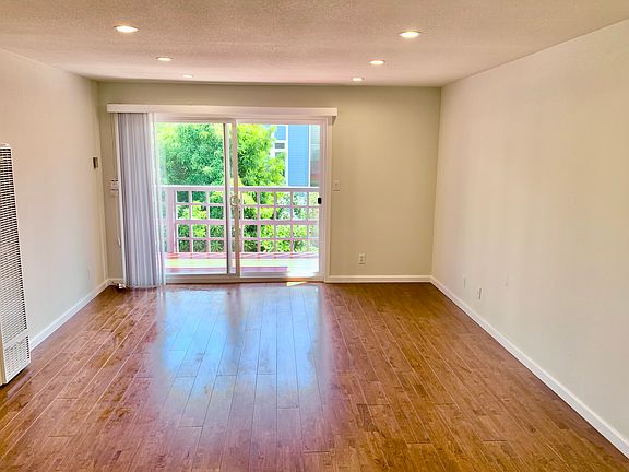Spacious living room with access to the patio