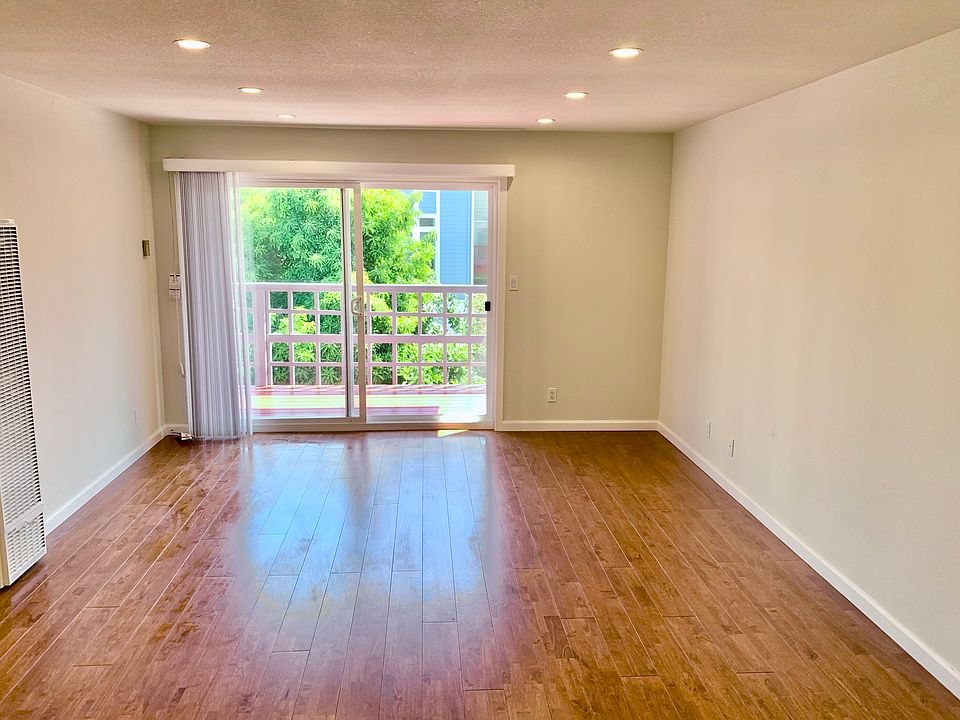 Spacious living room with access to the patio