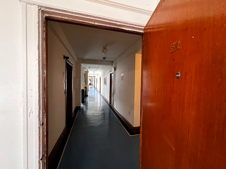 Looking down hallway from apartment.