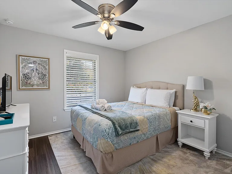Secondary Bedroom Queen Plush Bed Full sized Dresser with Mirror and large walk in closet