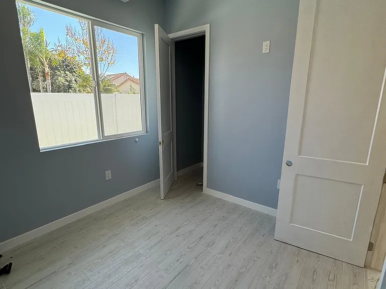 Bedrooms each have minisplit and closet. Ceiling fan changes light colors. 10' ceilings.