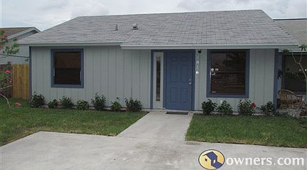 front of the house with 2 parking spaces