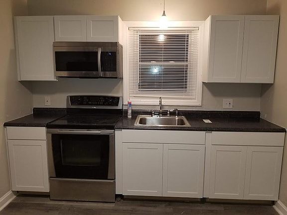 Updated Kitchen - New LVP Flooring, LED Lighting, Countertops, Cabinets and Appliances