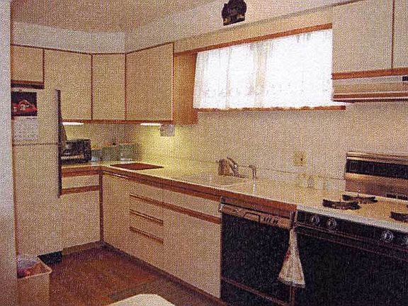 well designed kitchen with built-in appliances