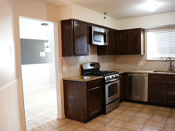 Granite and newly stained cabinets