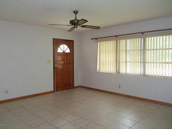 Front door leading into living room