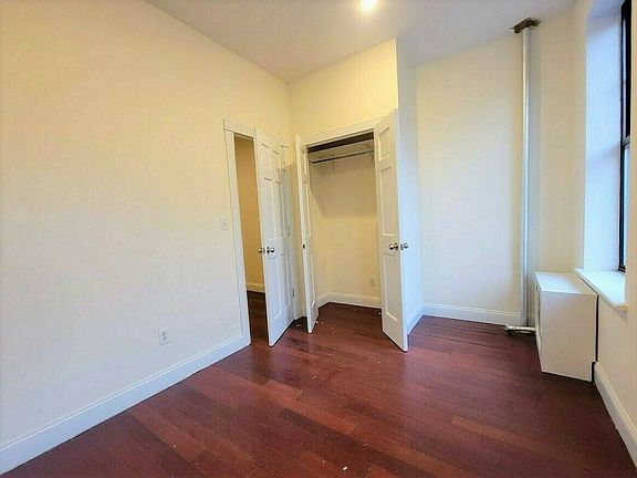 4th image of 111 E 7th St APT 54