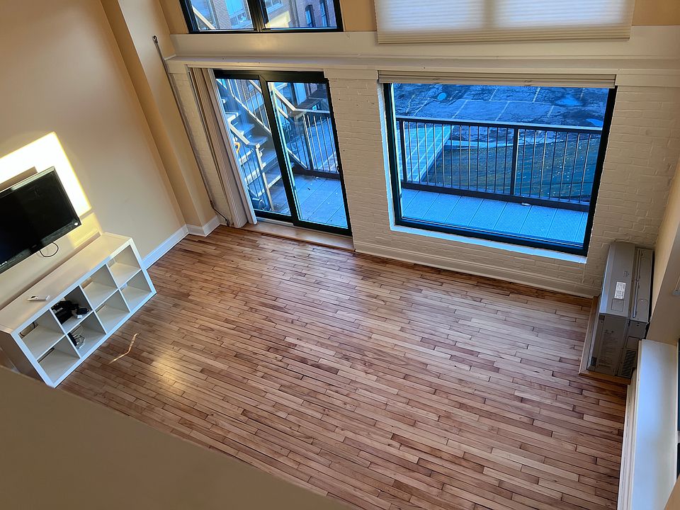 View of living room from loft bedroom