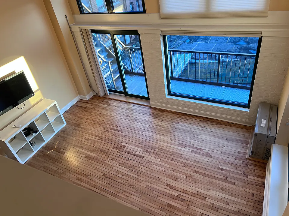 View of living room from loft bedroom
