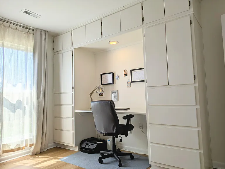 Master Bedroom: Built in cabinets with desk.