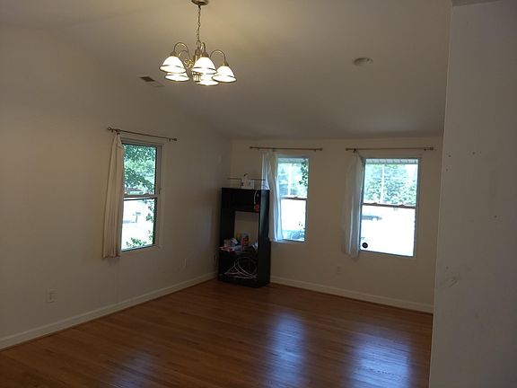 Spacious Family Room With 3 sides views to outdoors.