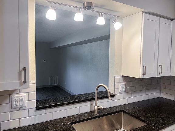 Pass-thru window kitchen to Living space.