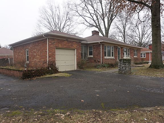 Corner lot with driveway off of
Six Mile Ln and Glen Oak Dr.