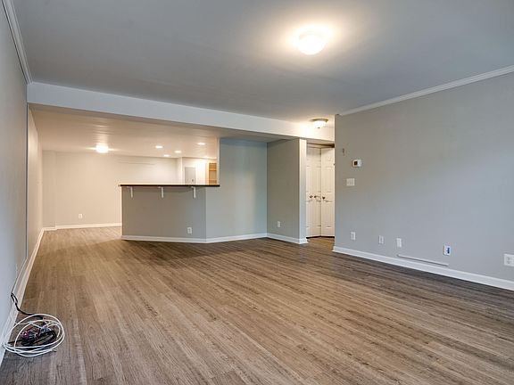 Large living area with luxury vinyl flooring
