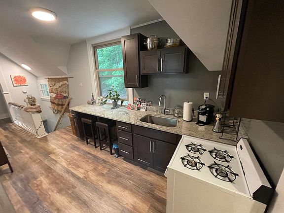 New Kitchen Cabinetry, Granite Countertops and LIfeProof Wooden Look Waterproof Flooring