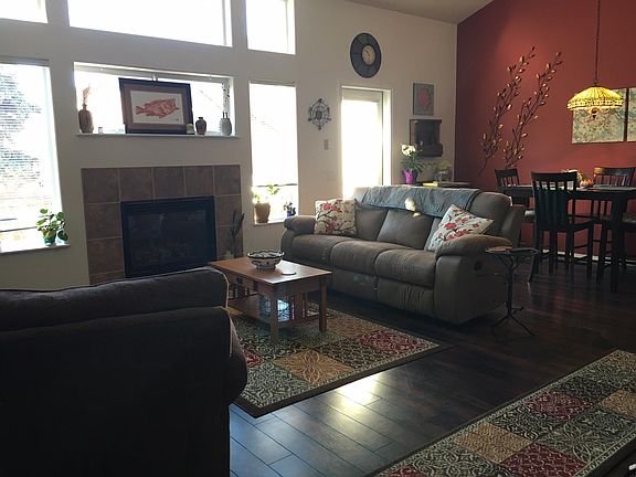Floor-to-ceiling windows in living room.
