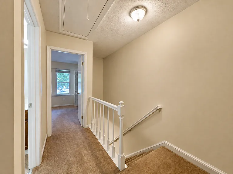 Second Floor hallway, looking from bedrooms #2 & #3 towards the master.