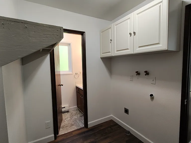Laundry room with plenty of storage! Washer/Dryer hook up. Washer and Dryer not included in rent.