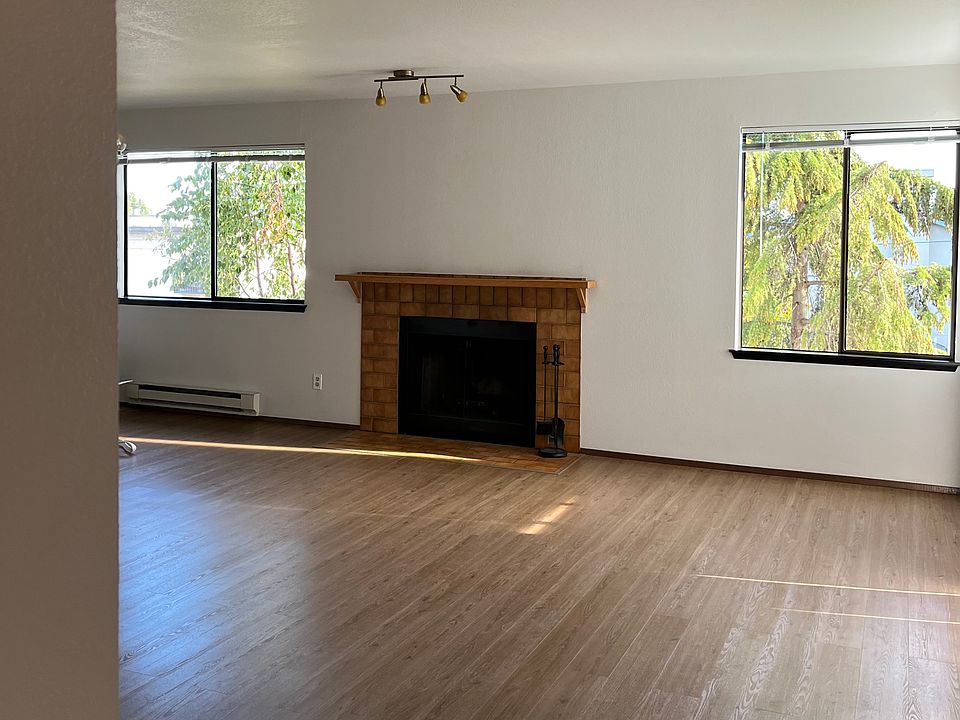 Living room is bright and cheerful even when it is raining, with southern and west exposure.