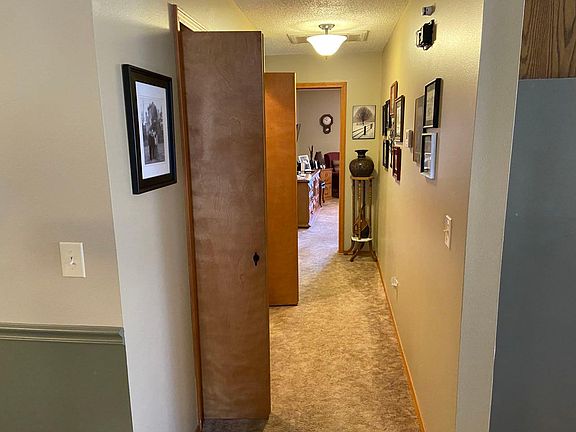 Hallway looking into master bedroom.