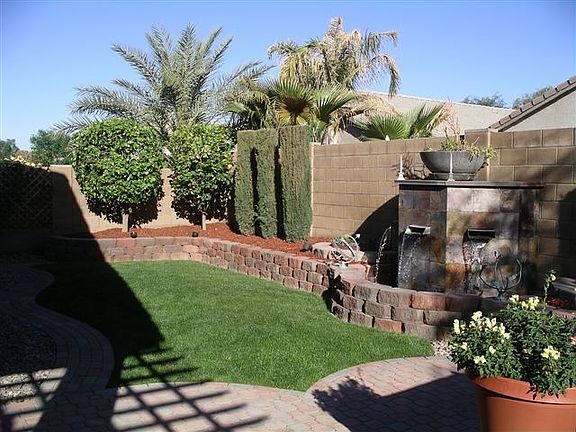 beautiful backyard with slate and copper fountain