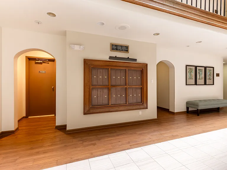 a nook for the elevator, another for the trash shoot and stylish mailboxes