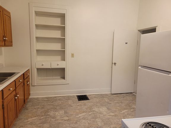 Kitchen - the bathroom is on the right.