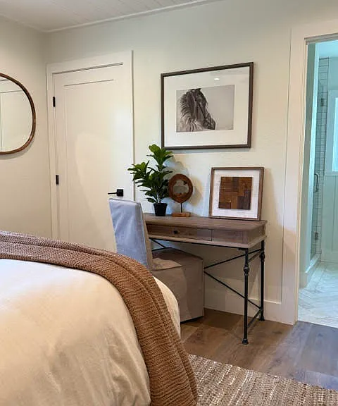 Bedroom 2, with desk, walk in closet with extra storage shelves. Full On suite bathroom