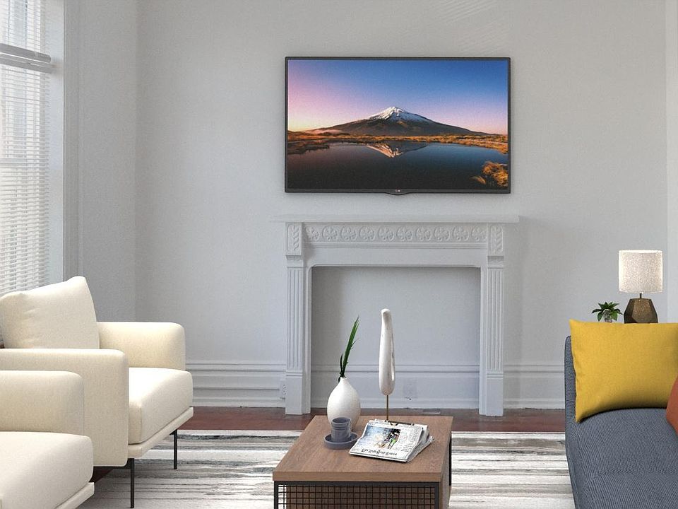 Living room with high ceiling and ceiling fan