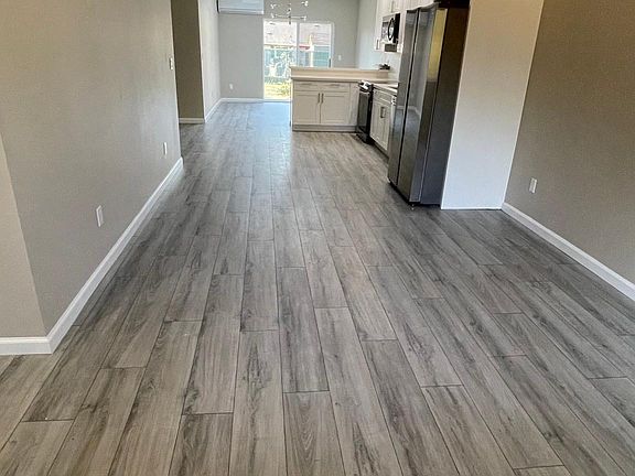 Common area: living room, kitchen, dining room
