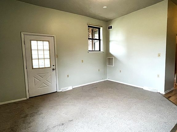 Living room (door opens to deck)