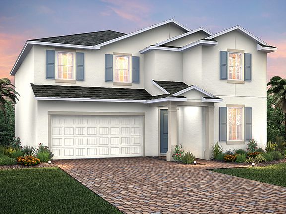 Home Exterior FM1A with decorative brick paver driveway