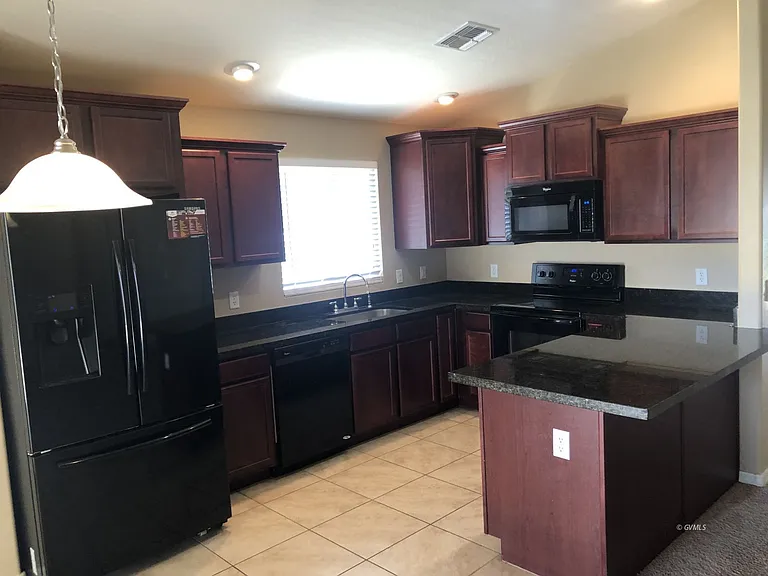 1294 S Kelson Pl — Photo 2