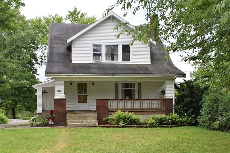 5634 Virginia Road welcomes you to this country setting nestled among the trees on a .91 acre corner lot.