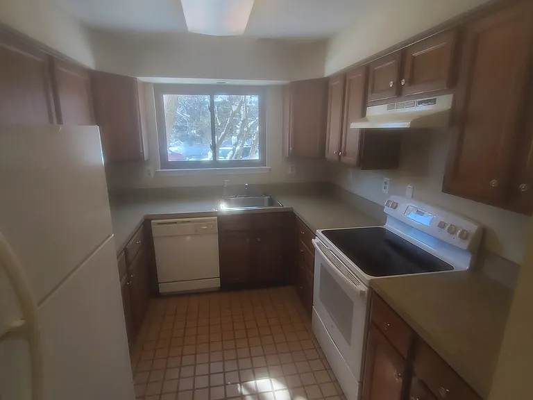 Kitchen has lots of Cabinets and counters