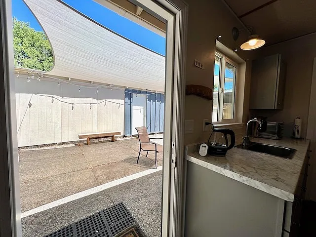 View from kitchenette to private patio