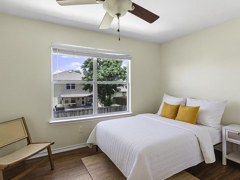 Full size bed and lots of light