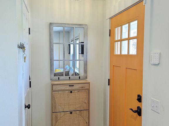 Front entrance with closet for coats and shoes.