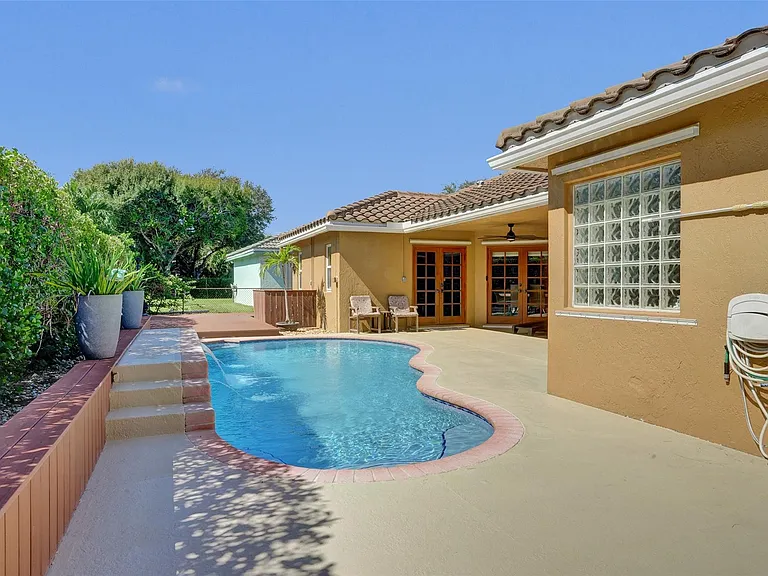 4142 NW 58th Dr — Photo 59