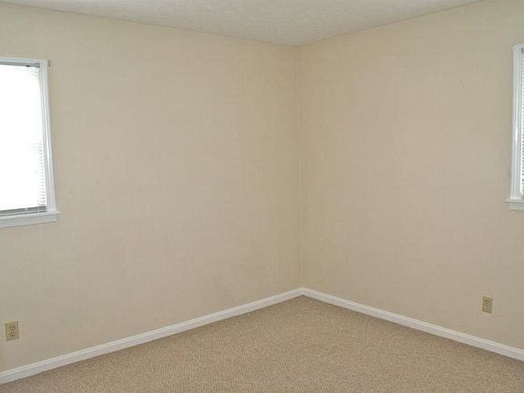 One of the Three Bedrooms