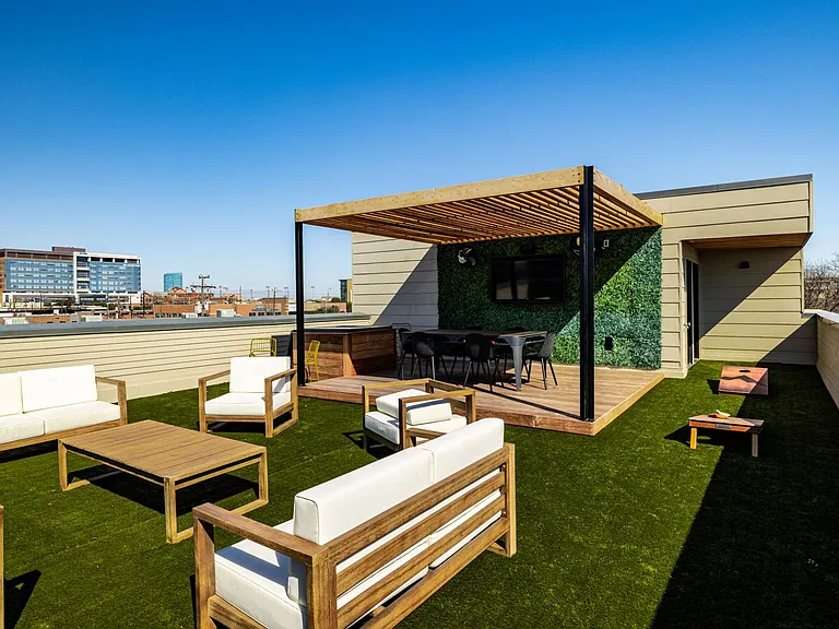 Rooftop terrace has plenty of seating to entertain friends and family!