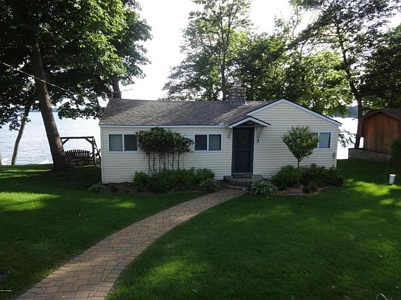 New siding, paved path.