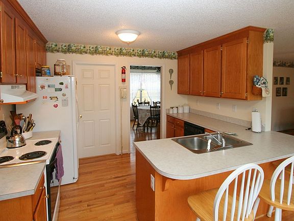 The Kitchen features 42" cabinets and a serving bar