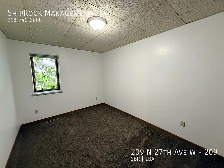 209 N 27th Ave W #209 — Photo 7